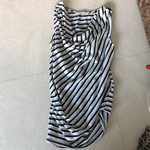 Shimmering silver, black and white top.